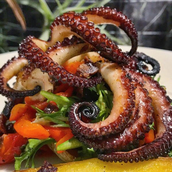 Grilled Octopus With Seasonal Vegetales and Olive-Tomato Tapenade
