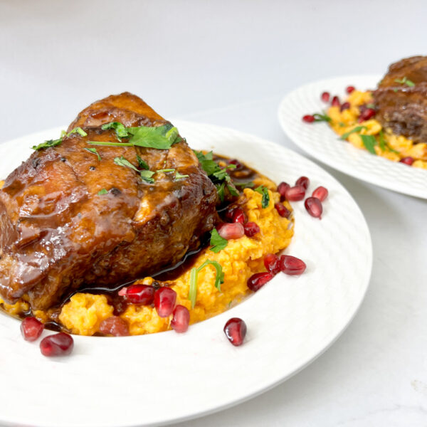 Braised Short Ribs with Pomegranate Molasses Jus on Sweet Potato Mash